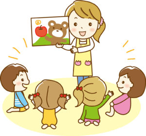 子供にお話しを聞かせる保育士